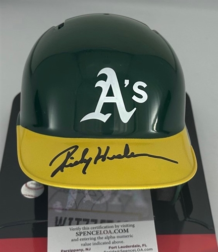 RICKEY HENDERSON SIGNED RAWLINGS ATHLETICS MINI HELMET - JSA